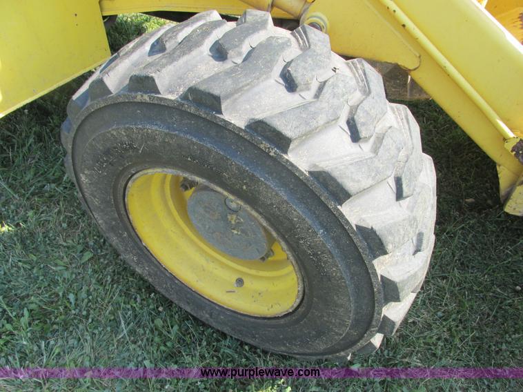 image for item E7365 2001 New Holland LB75 backhoe