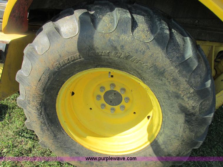 image for item E7365 2001 New Holland LB75 backhoe