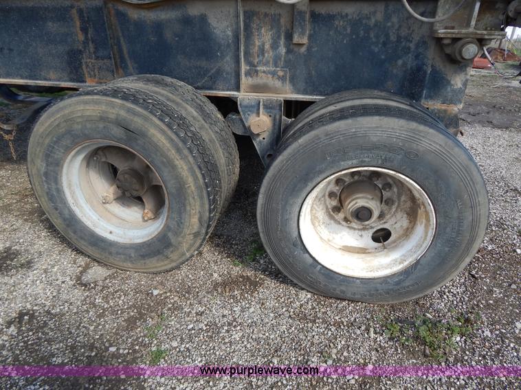 image for item G3090 1975 Fruehauf 27' end dump barrel trailer