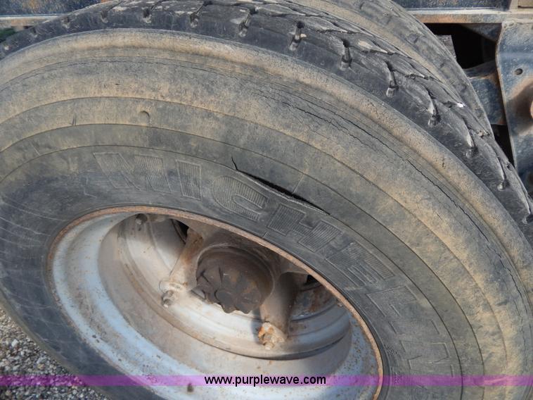 image for item G3090 1975 Fruehauf 27' end dump barrel trailer