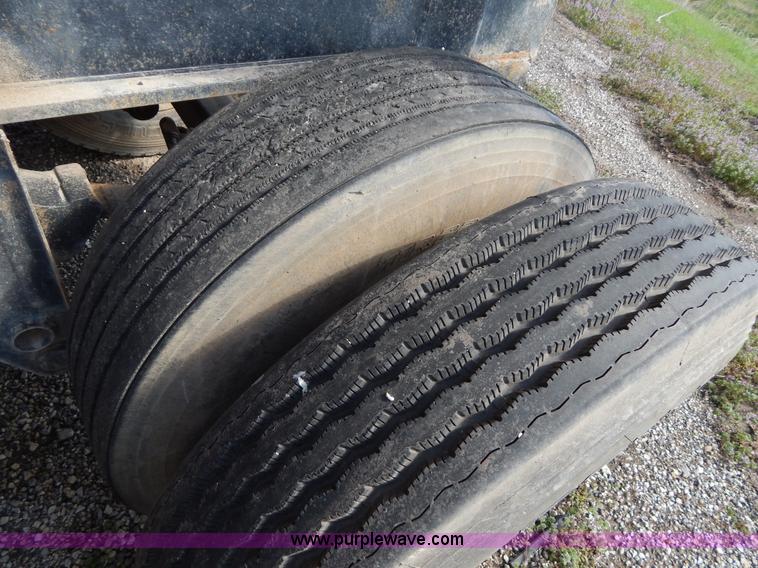 image for item G3090 1975 Fruehauf 27' end dump barrel trailer