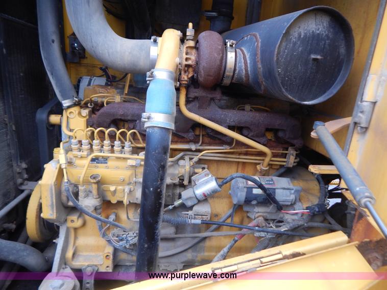 image for item G3466 1999 John Deere 624H wheel loader