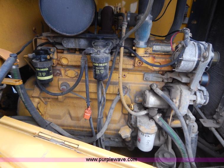 image for item G3466 1999 John Deere 624H wheel loader