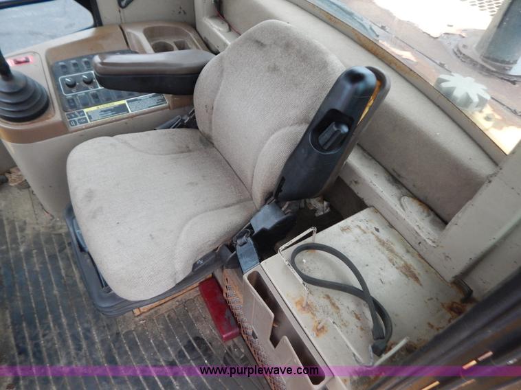 image for item G3466 1999 John Deere 624H wheel loader