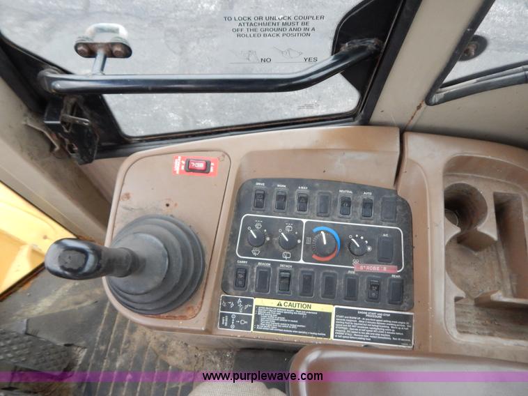 image for item G3466 1999 John Deere 624H wheel loader