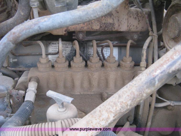 image for item H6442 1985 Mack R686ST barrel dump truck