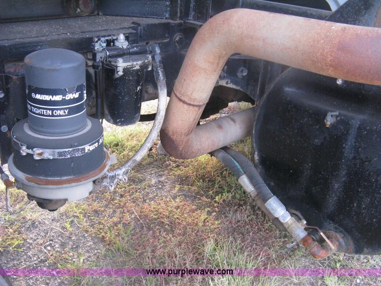 image for item H6442 1985 Mack R686ST barrel dump truck