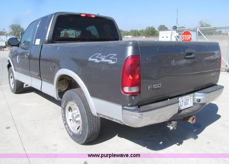 image for item E4561 2003 Ford F150 XLT SuperCab pickup truck