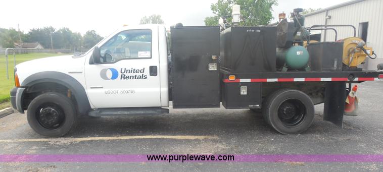 image for item I1336 2006 Ford F550 flatbed lube truck