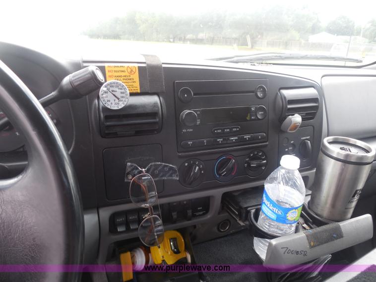 image for item I1336 2006 Ford F550 flatbed lube truck