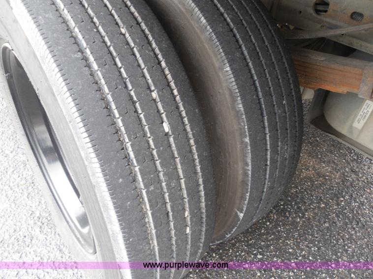 image for item I1336 2006 Ford F550 flatbed lube truck