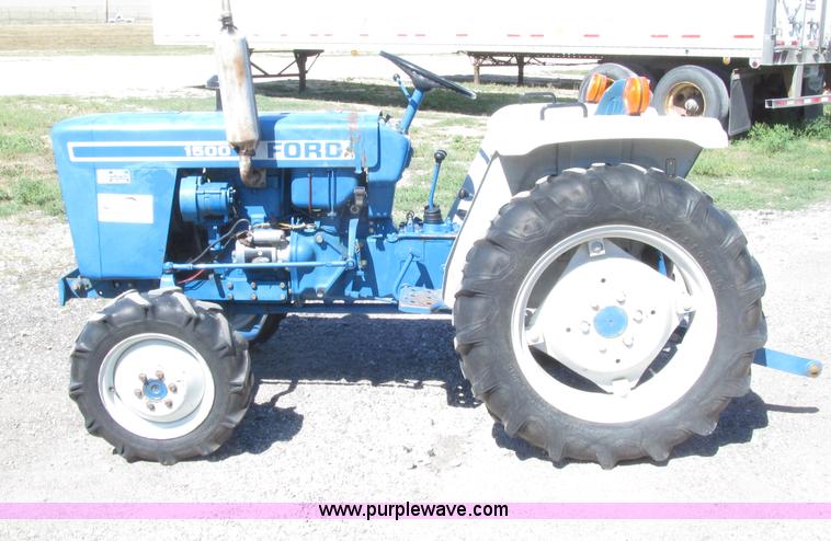 image for item E4505 Ford 1500 MFWD utility tractor