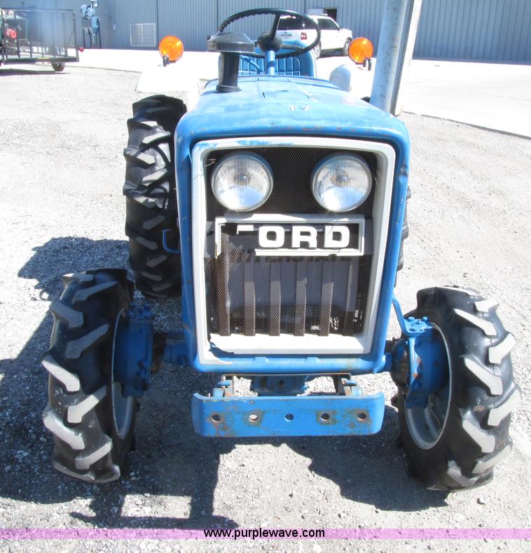 image for item E4505 Ford 1500 MFWD utility tractor
