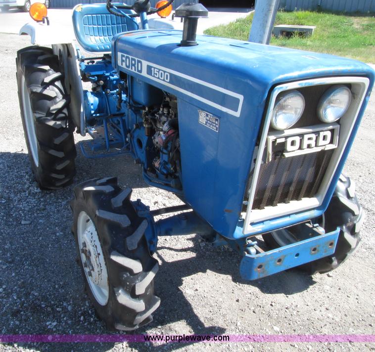 image for item E4505 Ford 1500 MFWD utility tractor