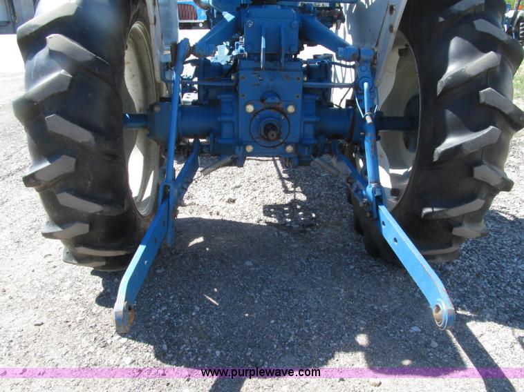 image for item E4505 Ford 1500 MFWD utility tractor