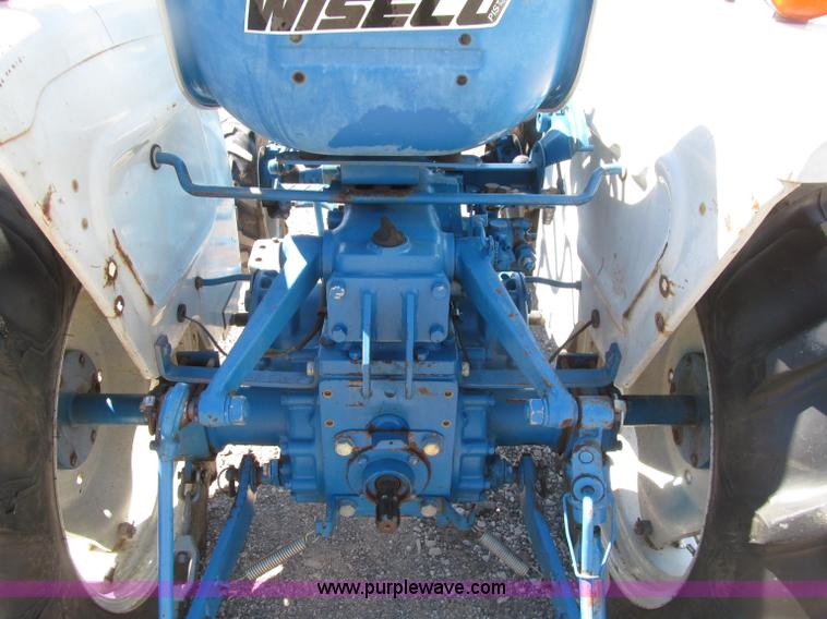 image for item E4505 Ford 1500 MFWD utility tractor