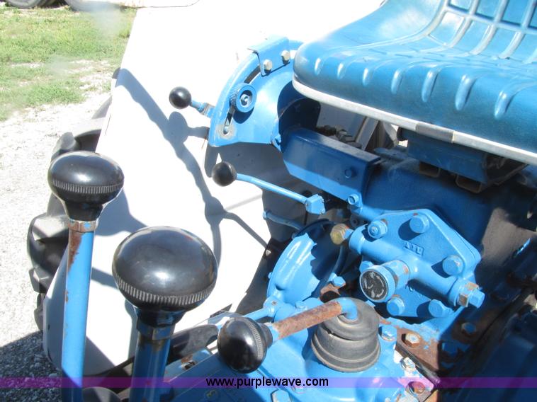 image for item E4505 Ford 1500 MFWD utility tractor