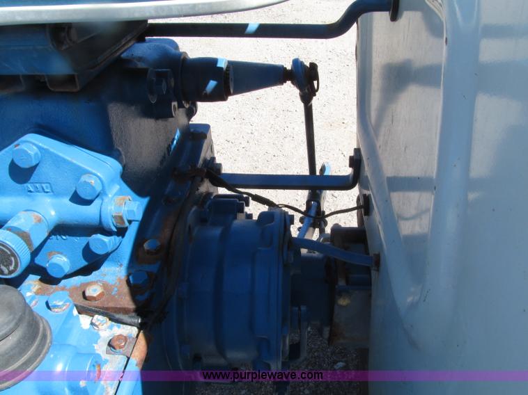 image for item E4505 Ford 1500 MFWD utility tractor