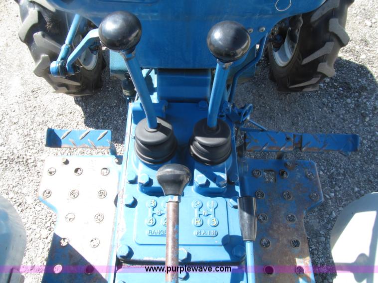 image for item E4505 Ford 1500 MFWD utility tractor