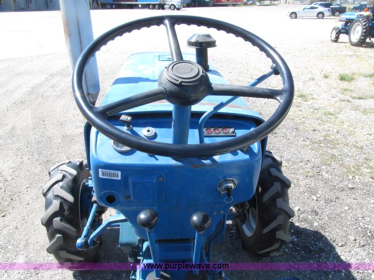 image for item E4505 Ford 1500 MFWD utility tractor