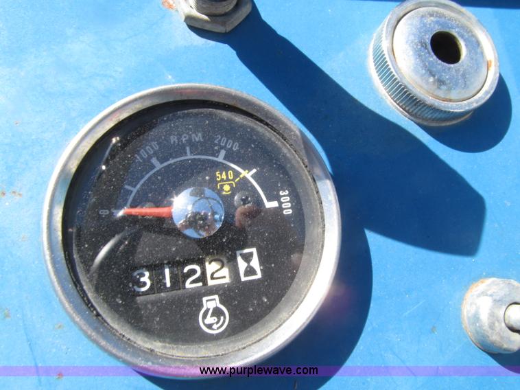 image for item E4505 Ford 1500 MFWD utility tractor