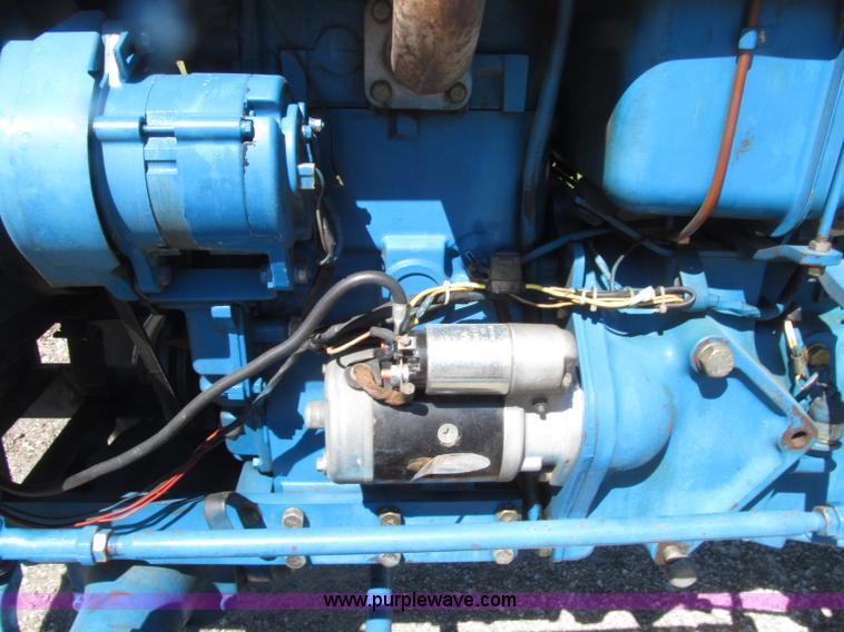 image for item E4505 Ford 1500 MFWD utility tractor