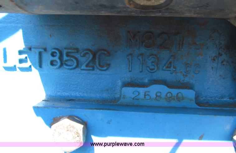 image for item E4505 Ford 1500 MFWD utility tractor