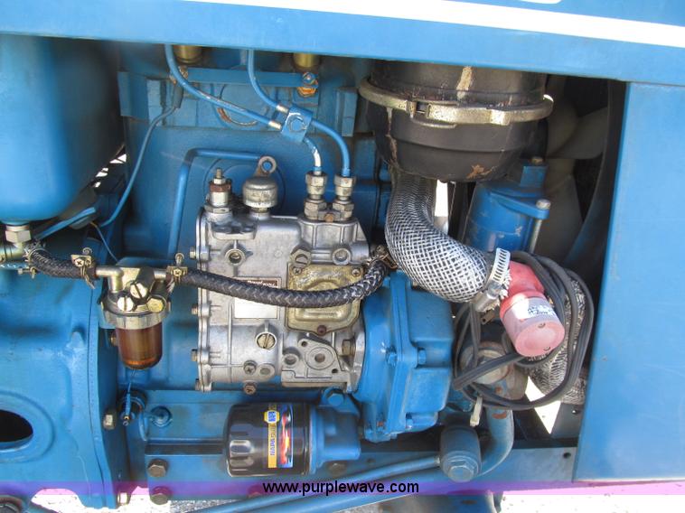 image for item E4505 Ford 1500 MFWD utility tractor