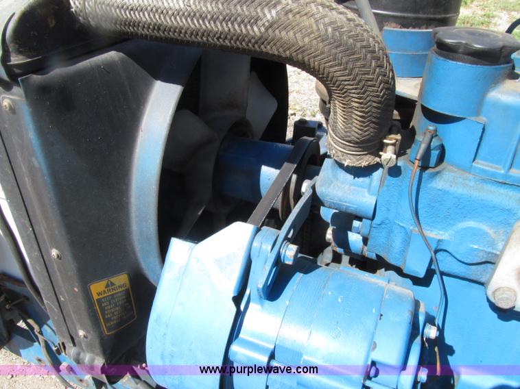 image for item E4505 Ford 1500 MFWD utility tractor