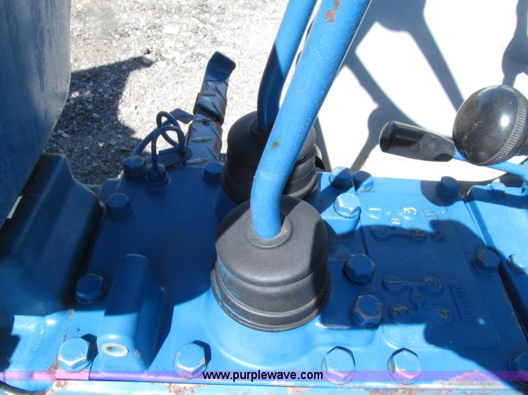 image for item E4505 Ford 1500 MFWD utility tractor