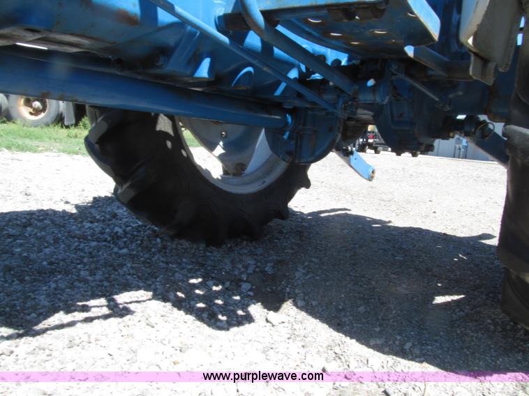 image for item E4505 Ford 1500 MFWD utility tractor