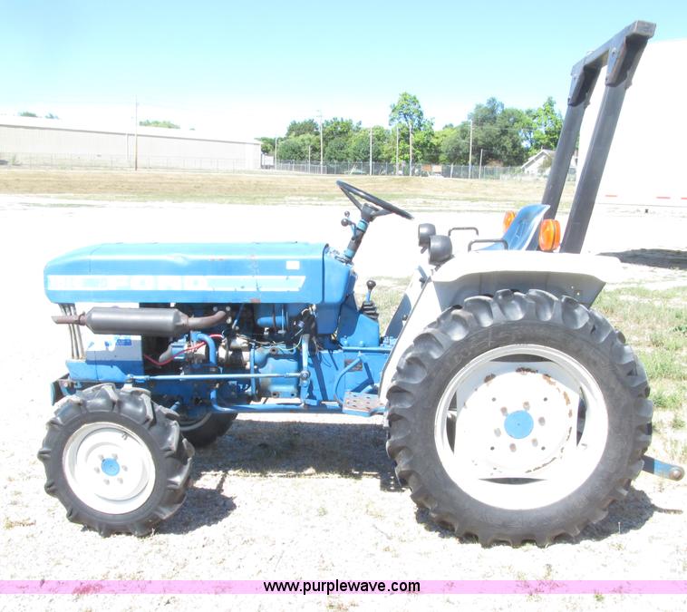 image for item E4506 Ford 1510 MFWD tractor
