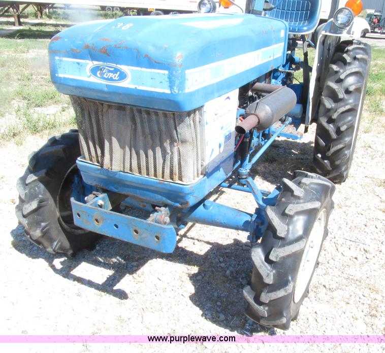 image for item E4506 Ford 1510 MFWD tractor