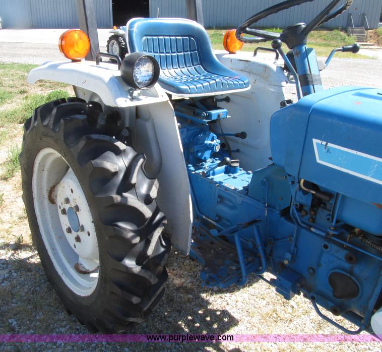image for item E4506 Ford 1510 MFWD tractor