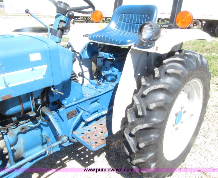 image for item E4506 Ford 1510 MFWD tractor