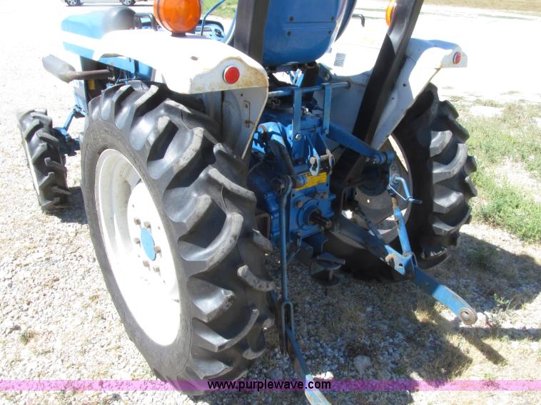 image for item E4506 Ford 1510 MFWD tractor
