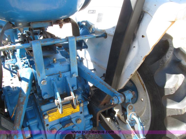 image for item E4506 Ford 1510 MFWD tractor