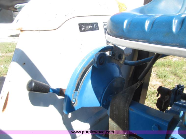 image for item E4506 Ford 1510 MFWD tractor
