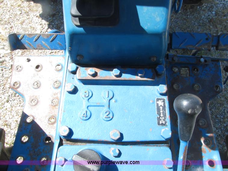 image for item E4506 Ford 1510 MFWD tractor
