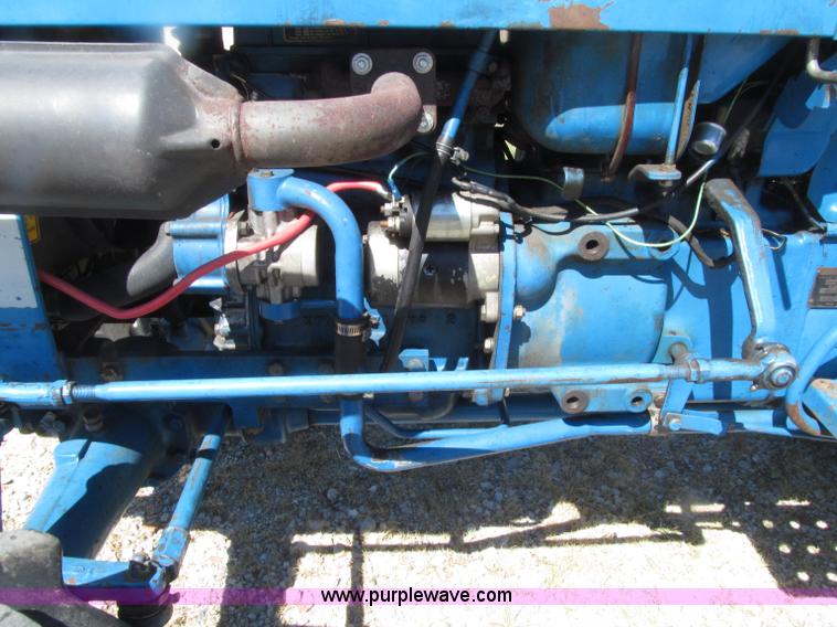 image for item E4506 Ford 1510 MFWD tractor