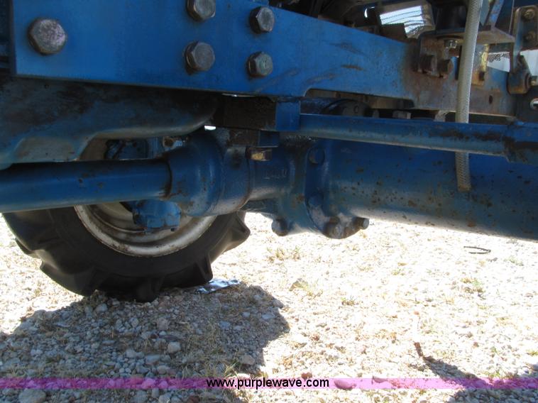image for item E4506 Ford 1510 MFWD tractor