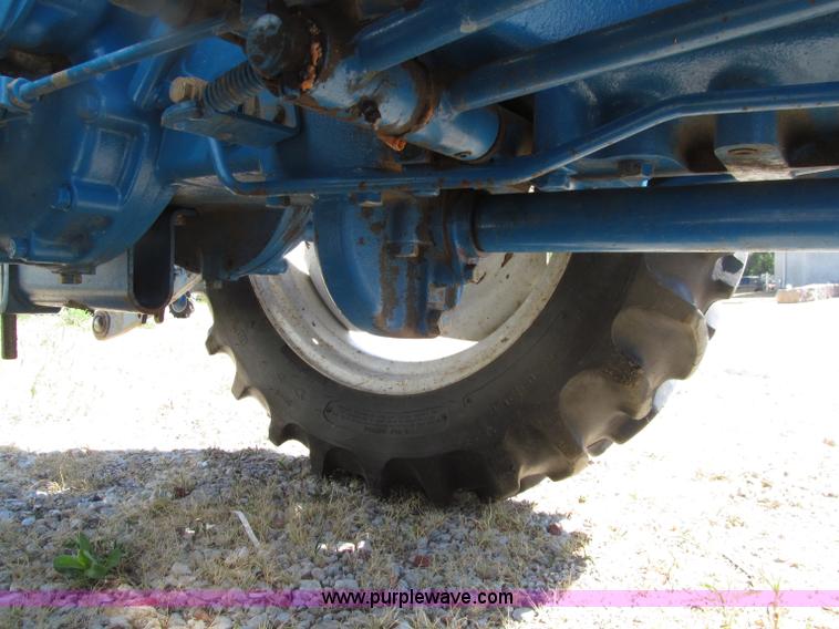 image for item E4506 Ford 1510 MFWD tractor