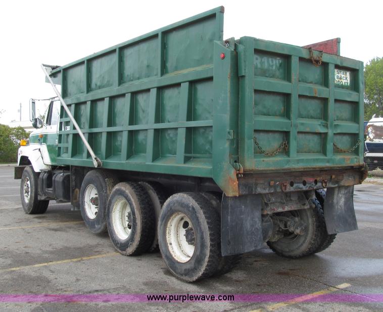 image for item E4574 1999 International 2674 triple axle dump truck