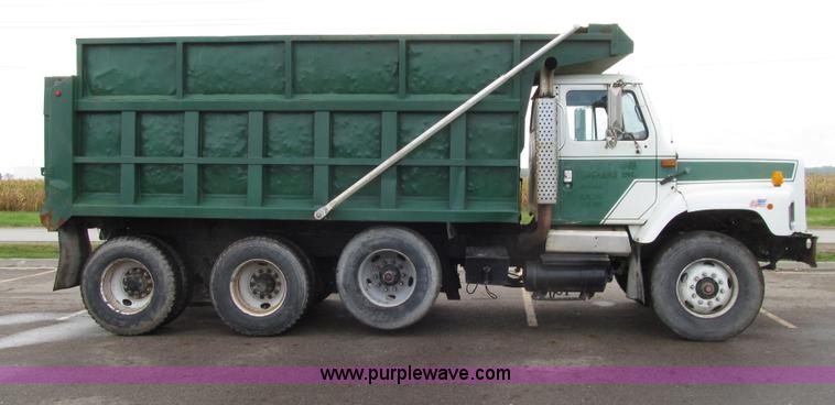 image for item E4574 1999 International 2674 triple axle dump truck