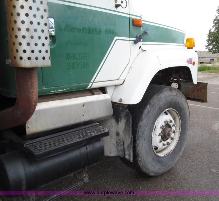 image for item E4574 1999 International 2674 triple axle dump truck