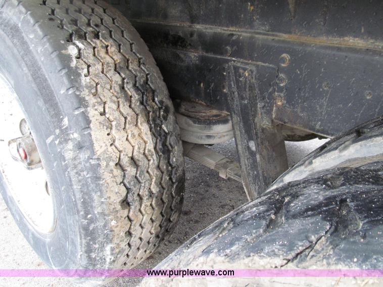 image for item E4574 1999 International 2674 triple axle dump truck