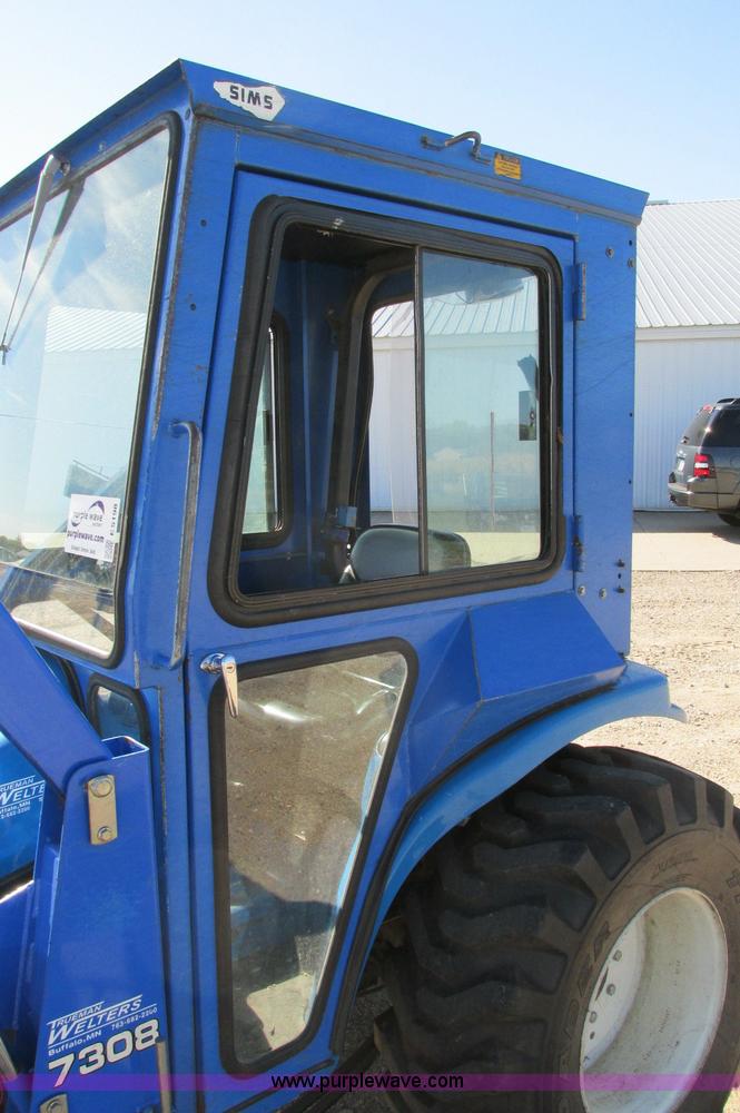 image for item E5198 2003 New Holland TC29 tractor