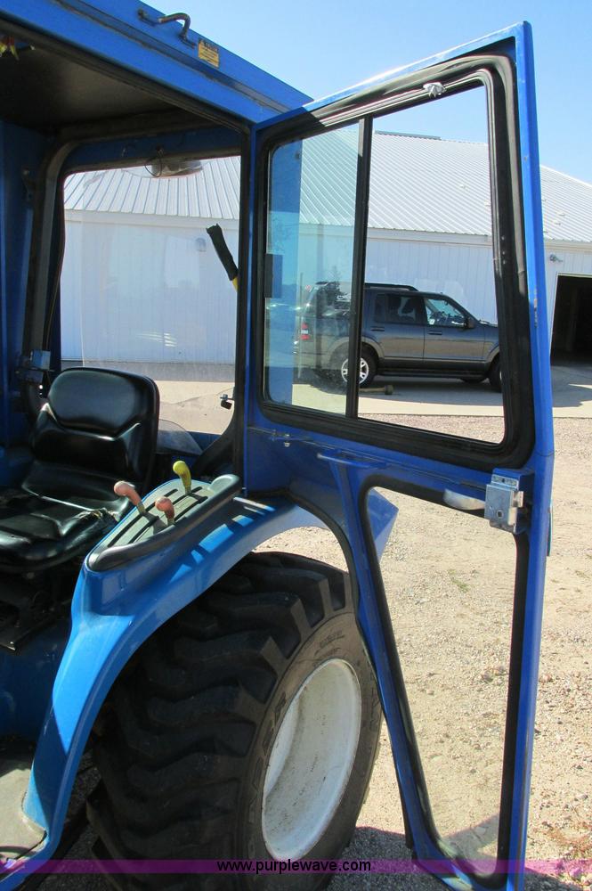 image for item E5198 2003 New Holland TC29 tractor