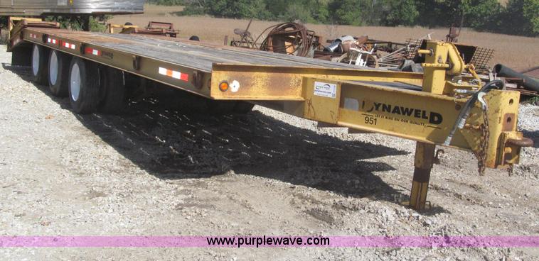 image for item F7138 2000 Dynaweld 951 30' triple axle equipment trailer