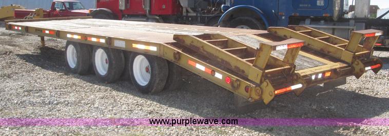 image for item F7138 2000 Dynaweld 951 30' triple axle equipment trailer